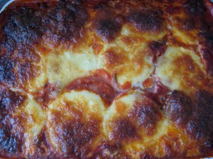 Put it in the oven to bake and go and join your friends for a chat.